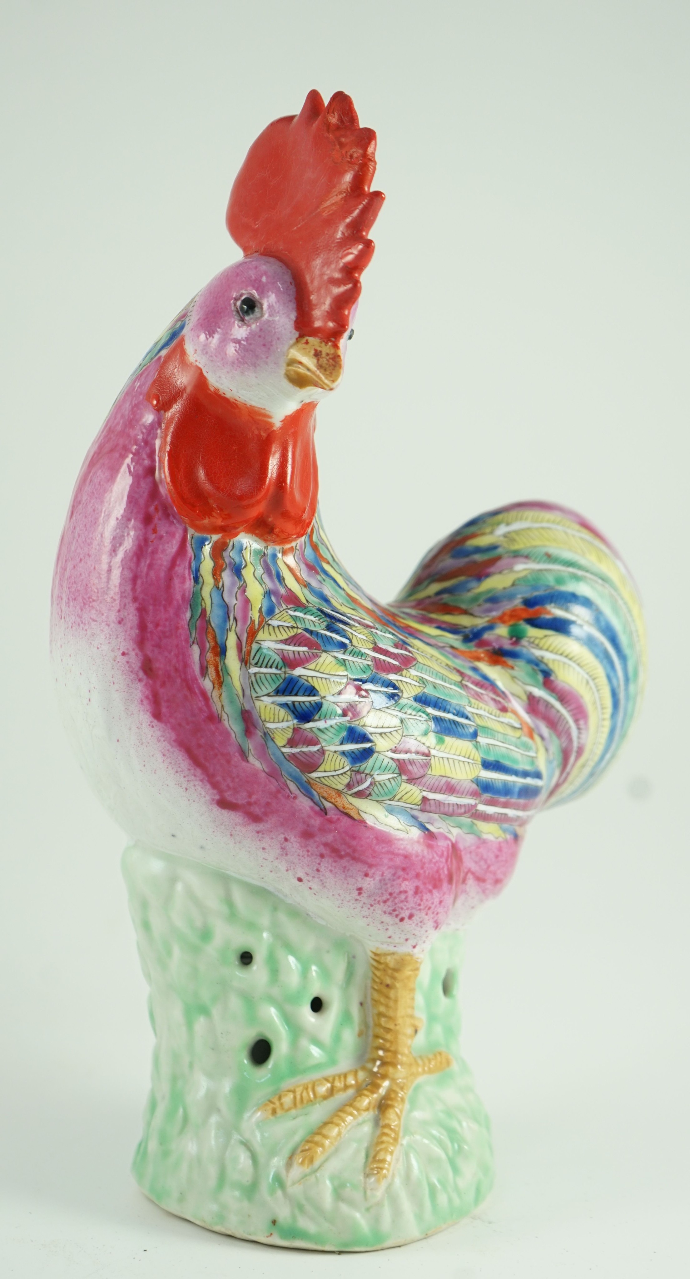 A Chinese enamelled porcelain model of a rooster, Jiaqing period, 29cm high, restoration